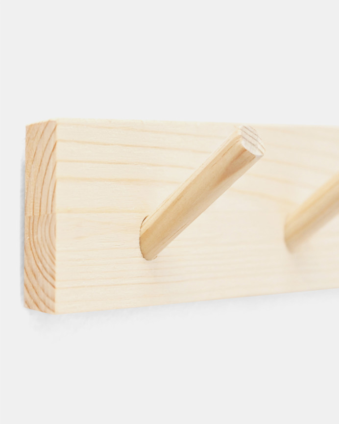 Colgador de pared de madera maciza en tono natural de 26x5cm
