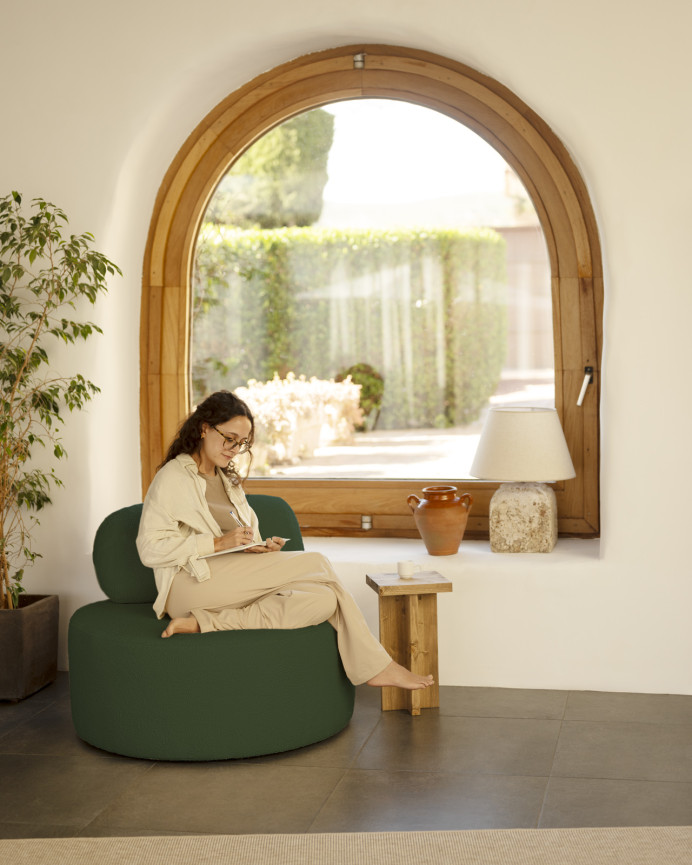 Fauteuil en bouclé rond couleur vert de 91x71cm