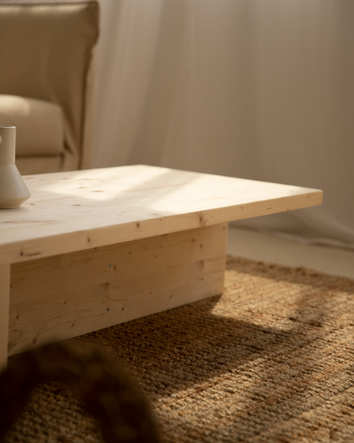 Table basse en bois massif ton naturel 124x27cm