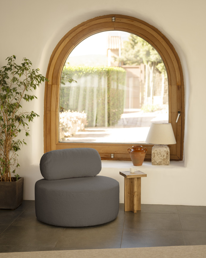 Fauteuil en bouclé rond couleur gris foncé de 91x71cm