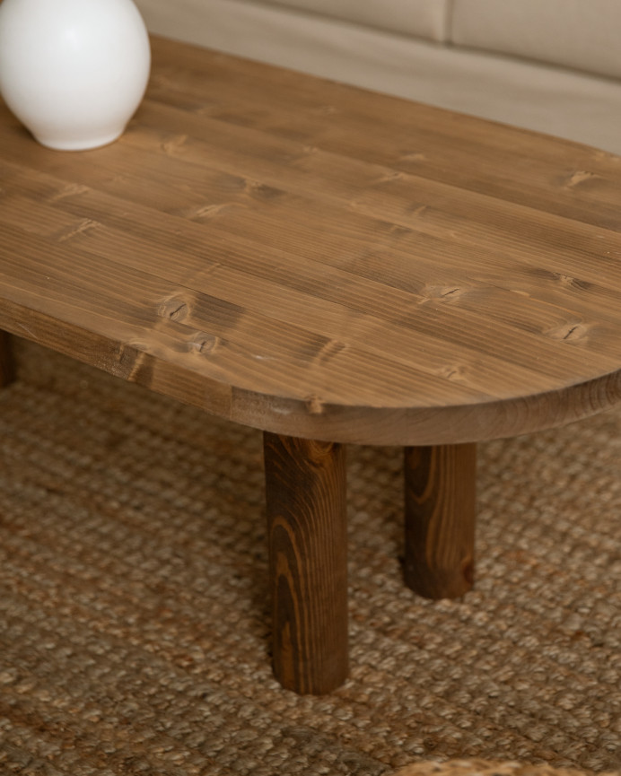 Table basse ovale en bois massif en teinte chêne foncé de 40x120cm